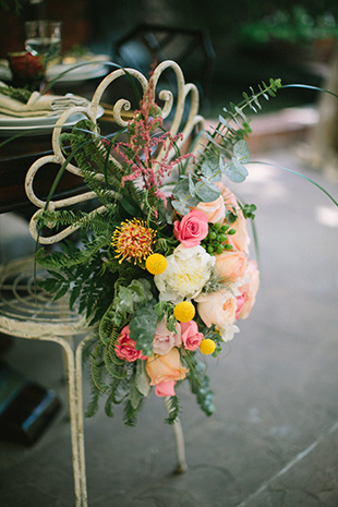 chair decorations using colourful flowers