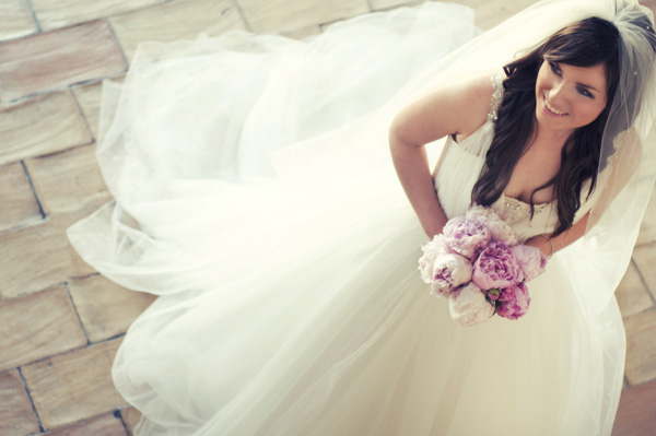 bride with princess gown and pink peony bouquet