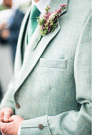 groom style tweed suit and floral boutonniere