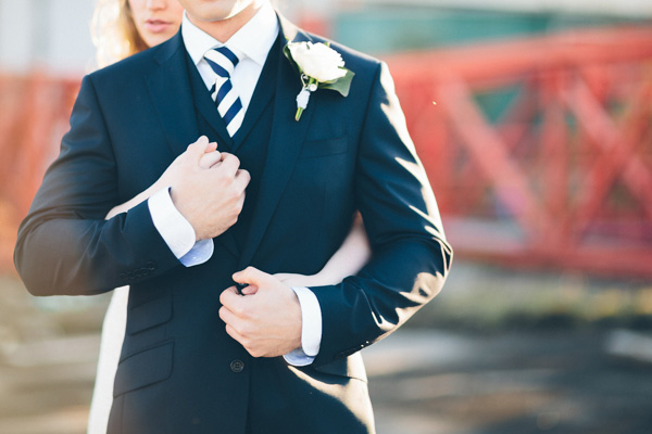 navy suit with stripey tie