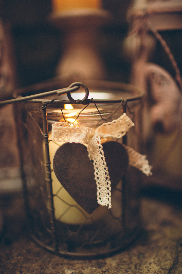 candle in mason jar with lace ribbon