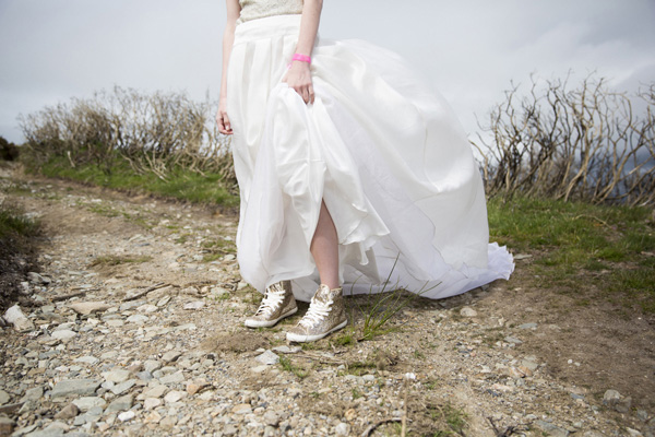 weddinfg style with gold trainers 