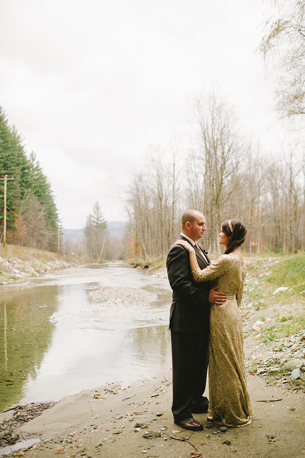 bride and groom at a lake