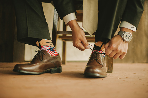 groom with colourful socks