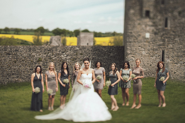 bride and purple and grey bridesmaids