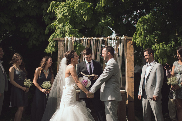 outdoor wedding reception with streamers and ribbon as decor