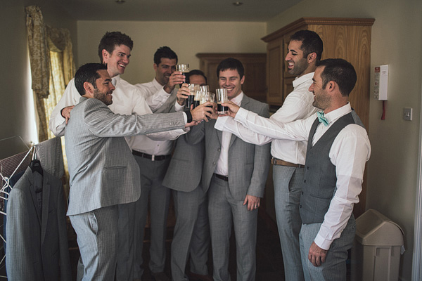 groom and groomsmen celebrating