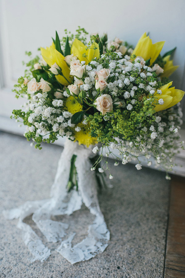 yellow flowers and baby's breathe bouquet