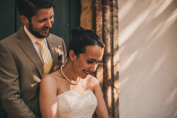 groom with stripey yellow tie