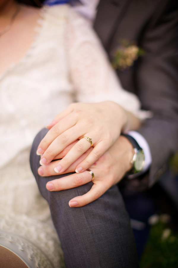 newlyweds holding hands