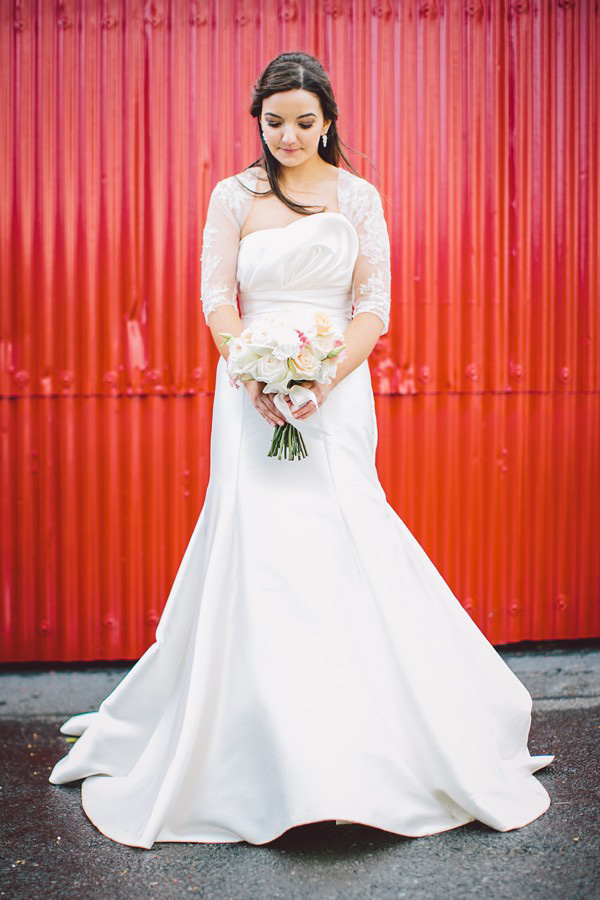 bride-against-a-red-backdrop-Gillian-Higgins-Photography-Riverdale-Barn http://onefabday-com-preprod.go-vip.net