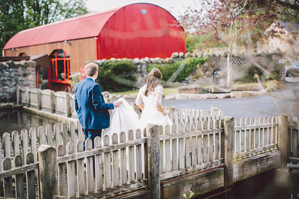 bride-and-groom-photoshoot-on-a-bridge-Gillian-Higgins-Photography-Riverdale-Barn http://onefabday-com-preprod.go-vip.net