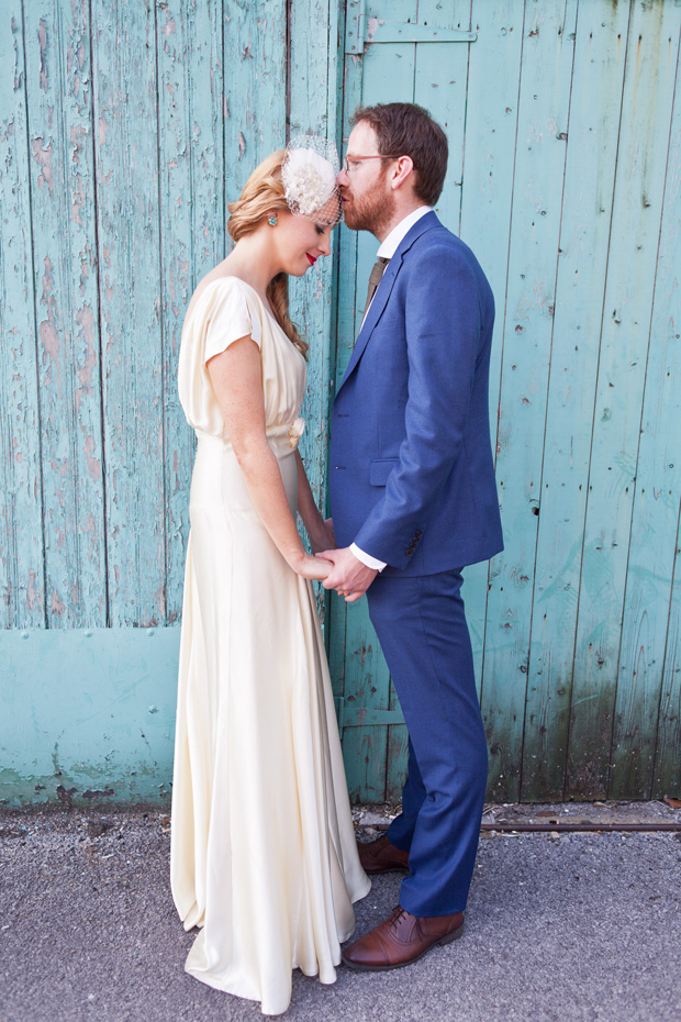 groom with bright blue suit