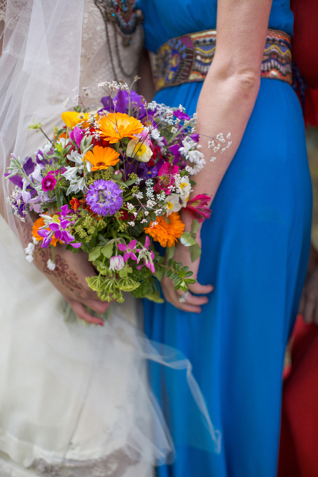 orange,purple,fuchsia and white bouquet