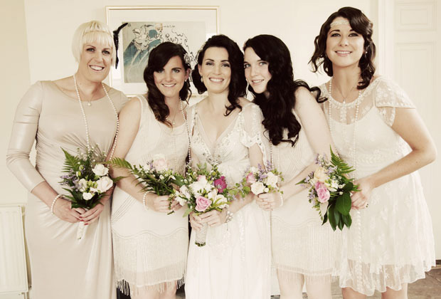 bride and bridesmaids with cream dresses