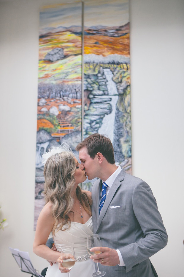 bride and groom kiss