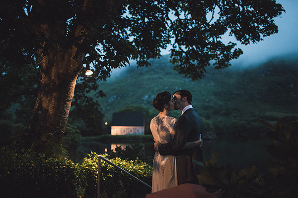 bride and groom first kiss