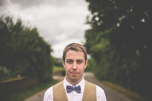 groom with blue bowtie