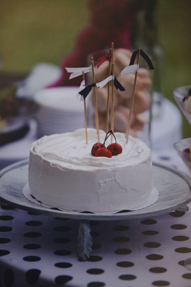 wedding cake with flag cake toppers