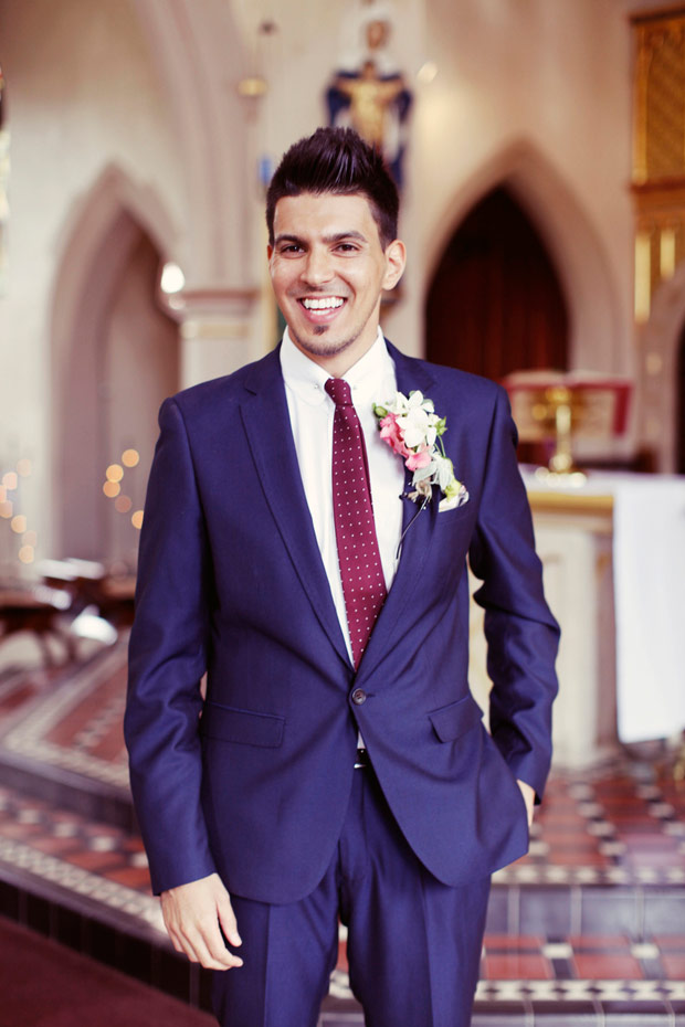 dapper groom in navy suit