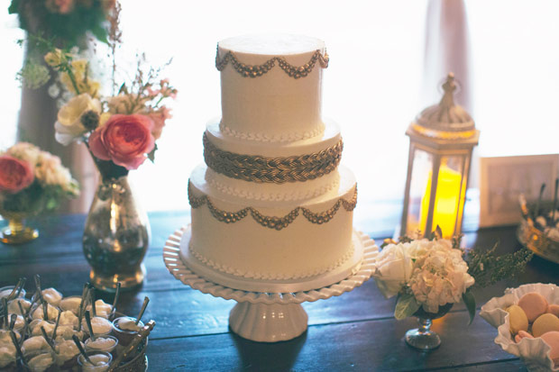 gold and white wedding cake