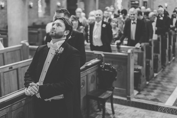 groom waiting in the church