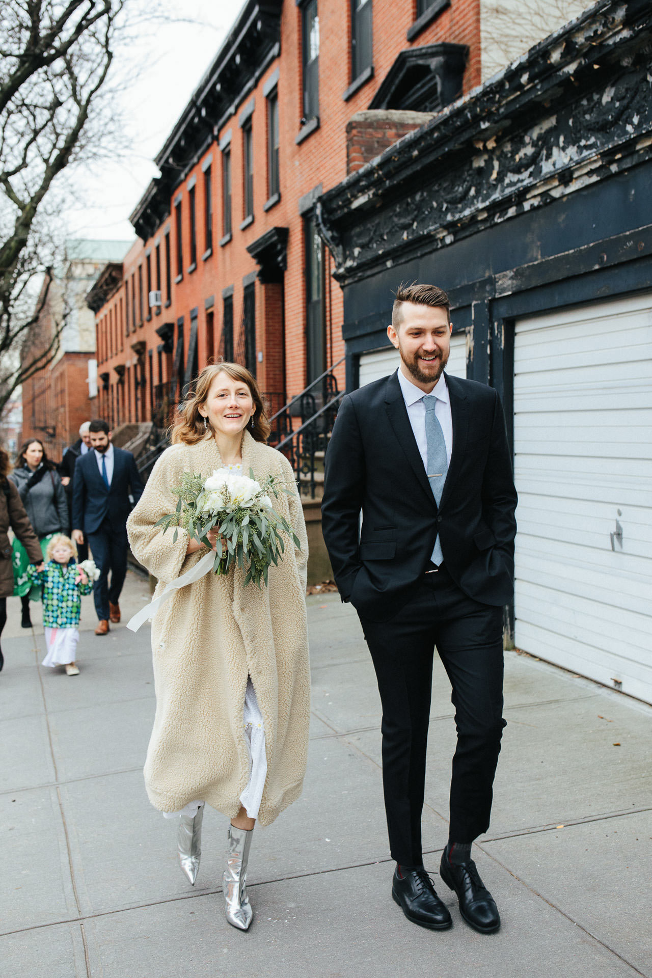 bride in teddy coat