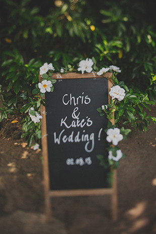 chalkboard wedding signage with flowers | onefabday.com