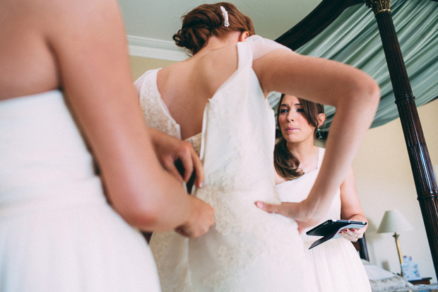 lace wedding dress | Gillian & Conor's Trudder Lodge wedding by Dara Munnis | onefabday.com