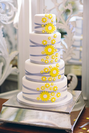 yellow daisy and grey stripe wedding cake | onefabday.com