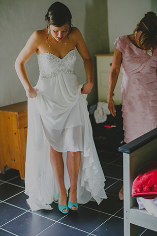 bride getting dressed | onefabday.com