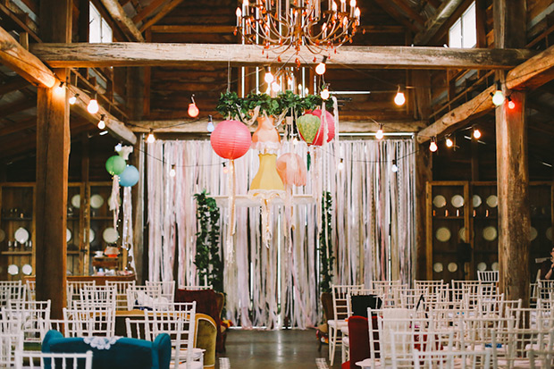 wonderfully eclectic wedding ceremony decor with lampshades and ribbons! onefabday.com