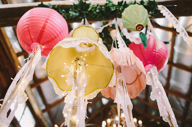 wonderfully eclectic wedding ceremony decor with lampshades and ribbons! onefabday.com