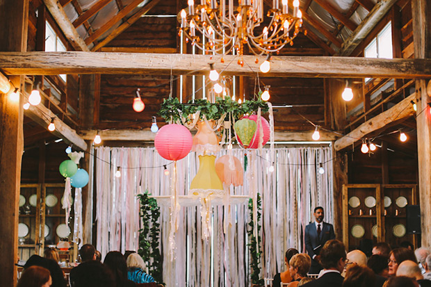 wonderfully eclectic wedding ceremony decor with lampshades and ribbons! onefabday.com