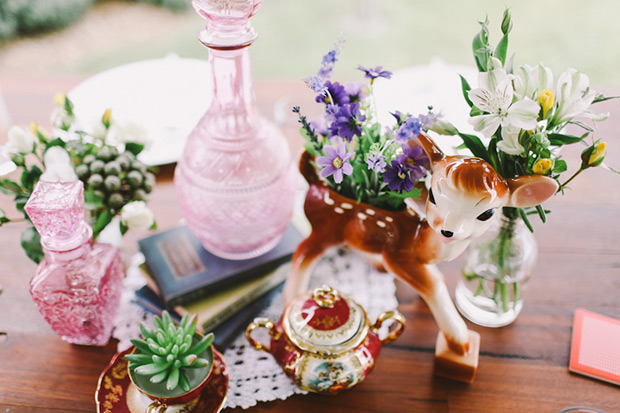 eclectic table centerpieces with florals and vintage trinkets | onefabday.com