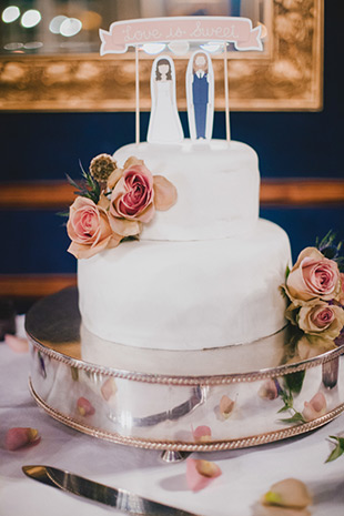 white cake with whimsical bride and groom cake topper | onefabday.com