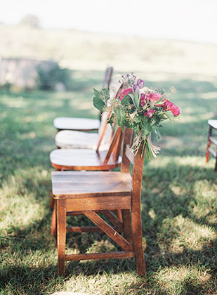 Wedding Chairs with red flowers | onefabday.com