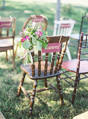 Reserved sign on wedding chair in plum red and gold | onefabday.com