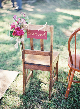 Reserved sign on wedding chair in plum red and gold | onefabday.com