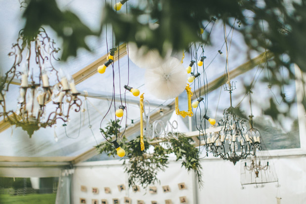 Amazing hanging lighting in a marquee wedding | onefabday.com