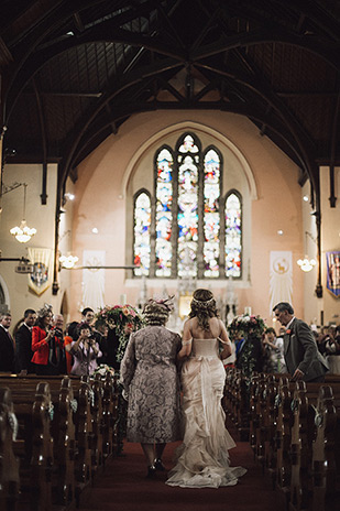 bride and her walking up the aisle | onefabday.com