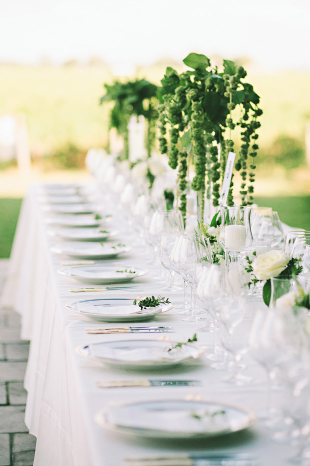 stunning white and green outdoor wedding reception decor at Stratus Vineyards | onefabday.com