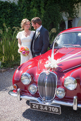 red vintage wedding car | onefabday.com