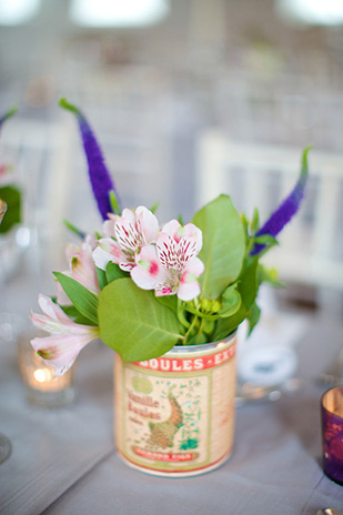 Pretty pink and purple floral centerpieces in vintage tins | onefabday.com