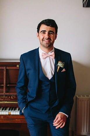 Dapper Alan in his navy 3 piece suit and pink bowtie | onefabday.com