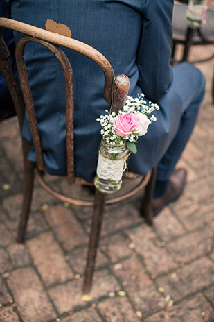 ceremony chair florals | Clare and Nathan's beautifully intimate wedding by I Heart Weddings | onefabday.com