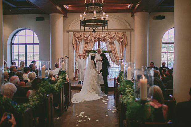 wedding ceremony with vintage pew ends, candles and foliage | onefabday.com