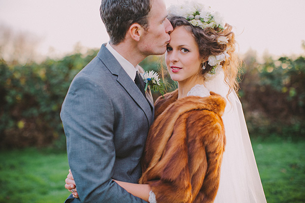 bride in fur jacket and floral hair garland | onefabday-com.go-vip.net