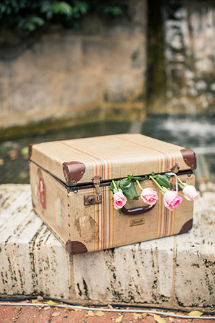 vintage suitcase decor | Clare and Nathan's beautifully intimate wedding by I Heart Weddings | onefabday.com