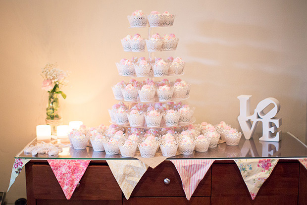 wedding cupcake tower | vintage typewriter guestbook | Clare and Nathan's beautifully intimate wedding by I Heart Weddings | onefabday.com